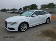 ✅ 2014 Audi A6 Prestige • VIN: WAUHMAFC2EN033040 • Лот: 91291415. Опубликован ранее на Copart с пробегом 189 986 миль. Бесплатный доступ к архиву аукционных продаж из США и подробный отчёт об истории автомобиля на DreamBid. Изображение 1.