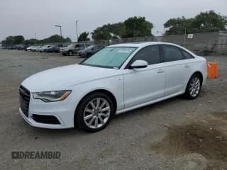 ✅ 2014 Audi A6 Prestige • VIN: WAUHMAFC2EN033040 • Лот: 91291415. Опубликован ранее на Copart с пробегом 189 986 миль. Бесплатный доступ к архиву аукционных продаж из США и подробный отчёт об истории автомобиля на DreamBid. Изображение 1.