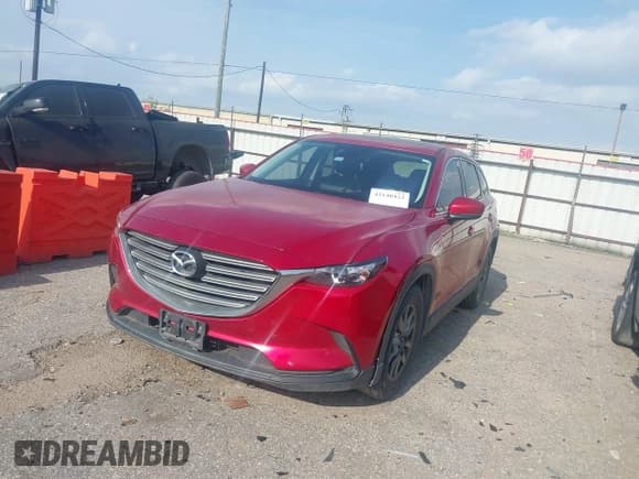 ✅ 2016 Mazda CX-9 Touring • VIN: JM3TCACY7G0116986 • Lot: 42140423. Listed on IAAI with 135,442 mi. Free auction sales archive from the USA and detailed vehicle history report at DreamBid. Image 16.