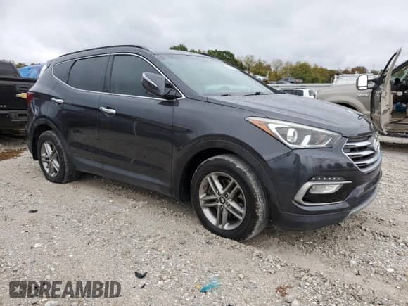 2018 Hyundai Santa Fe 2.4L z VIN 5XYZU3LB7JG543240, wystawiony jako Copart lot #89693095 z przebiegiem 121 636 mil mil oraz Czysty tytuł • Clean title. Historia ofert i sprzedaży dostępna na DreamBid. Obrazek 4.