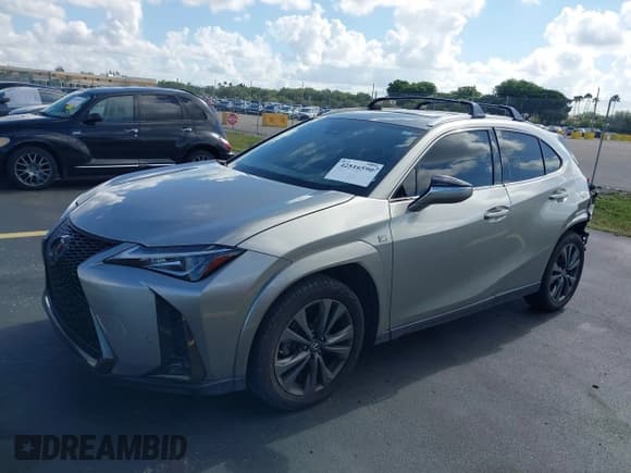 ✅ 2022 Lexus UX 200 F Sport • VIN: JTHE3JBH9N2048306 • Лот: 42516590. Опубликован ранее на IAAI с пробегом 73 139 миль. Бесплатный доступ к архиву аукционных продаж из США и подробный отчёт об истории автомобиля на DreamBid. Изображение 2.
