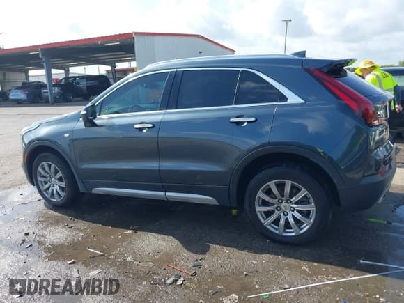 ✅ 2021 Cadillac XT4 FWD Premium Luxury • VIN: 1GYFZCR42MF007617 • Лот: 42437974. Опубликован ранее на IAAI с пробегом 126 071 миль. Бесплатный доступ к архиву аукционных продаж из США и подробный отчёт об истории автомобиля на DreamBid. Изображение 14.