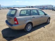 ✅ 2003 Ford Focus SE Fleet • VIN: 1FAFP36353W238779 • Lot: 42749830. Listed on IAAI with 193,039 mi. Free auction sales archive from the USA and detailed vehicle history report at DreamBid. Image 4.