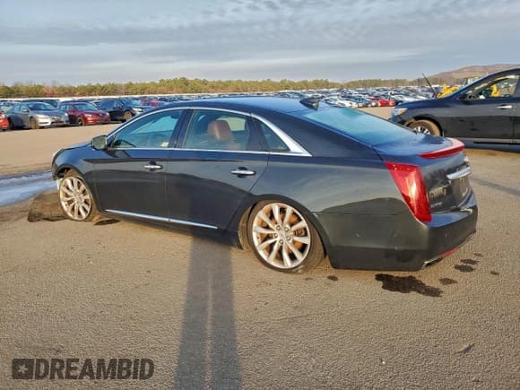 ✅ 2015 Cadillac XTS Luxury • VIN: 2G61M5S39F9203791 • Lot: 82331875. Wystawiony na Copart z przebiegiem 135 011 mil. Bezpłatny archiwum sprzedaży aukcyjnych z USA i szczegółowy raport historii pojazdu na DreamBid. Zdjęcie 2.