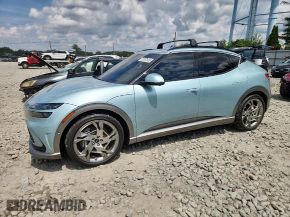 ✅ 2023 Genesis GV60 Performance • VIN: KMUKEDTB4PU013106 • Лот: 65167855. Опубликован ранее на Copart с пробегом 21 522 миль. Бесплатный доступ к архиву аукционных продаж из США и подробный отчёт об истории автомобиля на DreamBid. Изображение 1.