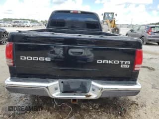 ✅ 2004 Dodge Dakota • VIN: 1D7FL46N44S634830 • Lot: 69702714. Wystawiony na Copart z przebiegiem 306 816 mil. Bezpłatny archiwum sprzedaży aukcyjnych z USA i szczegółowy raport historii pojazdu na DreamBid. Zdjęcie 6.