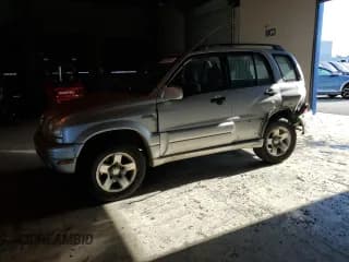 ✅ 2000 Suzuki Grand Vitara JLX • VIN: JS3TD62V5Y4107709 • Lot: 85520975. Listed on Copart with 167,142 mi. Free auction sales archive from the USA and detailed vehicle history report at DreamBid. Image 1.