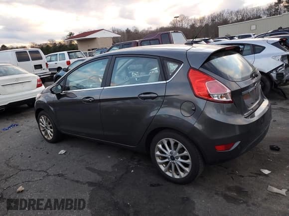 ✅ 2017 Ford Fiesta Titanium • VIN: 3FADP4FJ3HM109507 • Lot: 87182664. Listed on Copart with 105,198 mi. Free auction sales archive from the USA and detailed vehicle history report at DreamBid. Image 2.