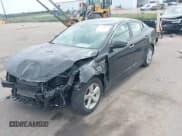 ✅ 2014 Kia Optima LX • VIN: 5XXGM4A7XEG340798 • Lot: 43241109. Listed on IAAI with 113,855 mi. Free auction sales archive from the USA and detailed vehicle history report at DreamBid. Image 2.