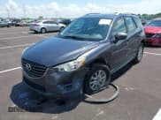 ✅ 2016 Mazda CX-5 Sport • VIN: JM3KE4BY4G0783619 • Lot: 42368512. Listed on IAAI with 115,694 mi. Free auction sales archive from the USA and detailed vehicle history report at DreamBid. Image 2.