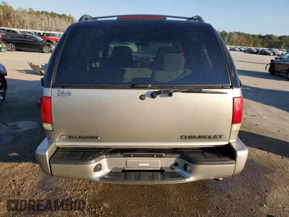 2001 Chevrolet Blazer LS с VIN 1GNCS13W71K244416, выставлен на аукционе Copart как лот 77312694 с пробегом 194 740 миль миль и Списание • Salvage title. История ставок и продаж доступна на DreamBid. Изображение 6.