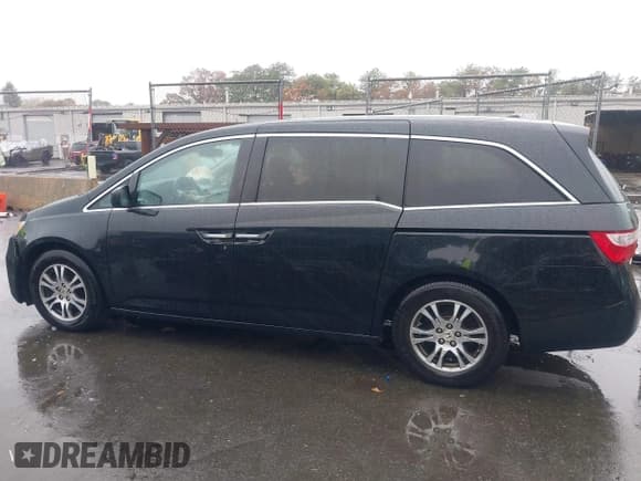 ✅ 2013 Honda Odyssey EX-L • VIN: 5FNRL5H69DB084251 • Лот: 43577151. Опубликован ранее на IAAI с пробегом 173 324 миль. Бесплатный доступ к архиву аукционных продаж из США и подробный отчёт об истории автомобиля на DreamBid. Изображение 14.