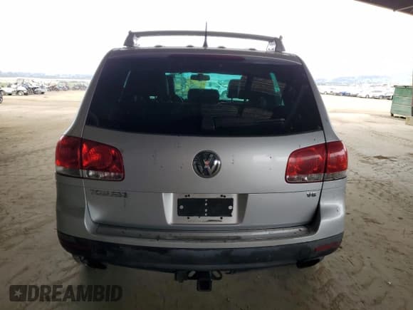 ✅ 2006 Volkswagen Touareg 4.2L V8 • VIN: WVGZM77L76D040030 • Lot: 53206065. Listed on Copart with 133,997 mi. Free auction sales archive from the USA and detailed vehicle history report at DreamBid. Image 6.