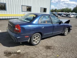 ✅ 2001 Daewoo Nubira CDX • VIN: KLAJB52Z31K647237 • Lot: 69299834. Wystawiony na Copart z przebiegiem 51 513 mil. Bezpłatny archiwum sprzedaży aukcyjnych z USA i szczegółowy raport historii pojazdu na DreamBid. Zdjęcie 3.