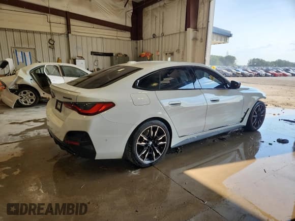 ✅ 2022 BMW 4 Series M440i xDrive • VIN: WBA13AW03NFM41096 • Lot: 68650185. Listed on Copart with 26,654 mi. Free auction sales archive from the USA and detailed vehicle history report at DreamBid. Image 3.