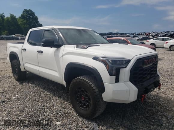 ✅ 2023 Toyota Tundra TRD Pro Hybrid • VIN: 5TFPC5DB9PX027956 • Lot: 64729205. Listed on Copart with 50,417 mi. Free auction sales archive from the USA and detailed vehicle history report at DreamBid. Image 4.