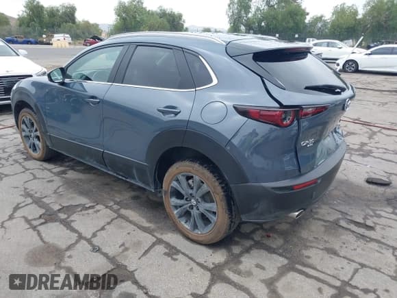✅ 2022 Mazda CX-30 S Carbon Edition • VIN: 3MVDMBCL0NM456154 • Lot: 42153202. Listed on IAAI with 40,372 mi. Free auction sales archive from the USA and detailed vehicle history report at DreamBid. Image 3.