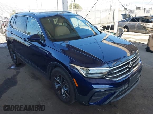 ✅ 2022 Volkswagen Tiguan SE • VIN: 3VV3B7AX0NM169565 • Lot: 43389301. Listed on IAAI with 30,159 mi. Free auction sales archive from the USA and detailed vehicle history report at DreamBid. Image 1.