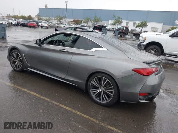 ✅ 2018 Infiniti Q60 Luxe • VIN: JN1EV7EL7JM391597 • Лот: 43703404. Опубликован ранее на IAAI с пробегом 49 485 миль. Бесплатный доступ к архиву аукционных продаж из США и подробный отчёт об истории автомобиля на DreamBid. Изображение 3.
