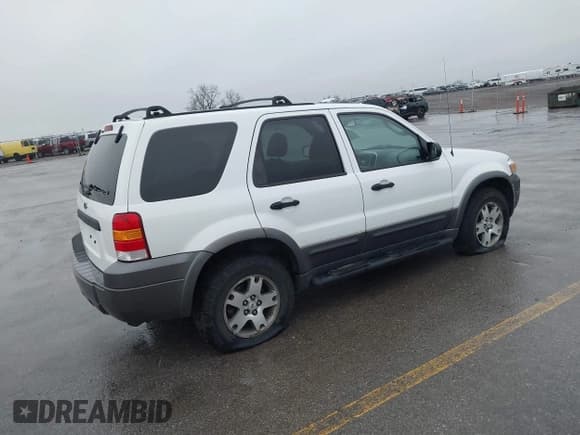 ✅ 2005 Ford Escape XLT • VIN: 1FMYU93125KA69876 • Lot: 41923043. Listed on IAAI with 186,306 mi. Free auction sales archive from the USA and detailed vehicle history report at DreamBid. Image 4.