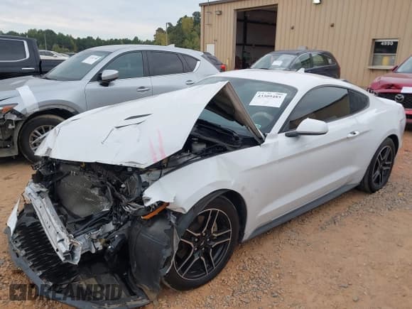 ✅ 2021 Ford Mustang EcoBoost • VIN: 1FA6P8TH9M5101140 • Lot: 43309485. Listed on IAAI with 69,861 mi. Free auction sales archive from the USA and detailed vehicle history report at DreamBid. Image 2.