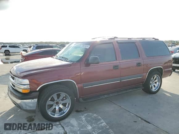 2002 Chevrolet Suburban LT z VIN 1GNEC16ZX2J211803, wystawiony jako Copart lot #78825824 z przebiegiem 267 175 mil mil oraz Czysty tytuł • Clean title. Historia ofert i sprzedaży dostępna na DreamBid. Obrazek 1.