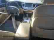 2011 Hyundai Genesis z VIN KMHGC4DE6BU112960, wystawiony jako Copart lot #75053284 z przebiegiem Nie podano mil oraz Szkoda całkowita • Salvage title. Historia ofert i sprzedaży dostępna na DreamBid. Obrazek 8.