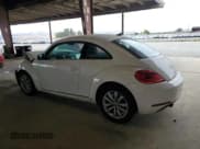 ✅ 2013 Volkswagen Beetle 2.0L TDI • VIN: 3VWJL7AT0DM686747 • Lot: 68773425. Listed on Copart with 95,825 mi. Free auction sales archive from the USA and detailed vehicle history report at DreamBid. Image 2.