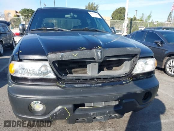 ✅ 2002 Lincoln Blackwood • VIN: 5LTEW05A62KJ03322 • Lot: 41537240. Listed on IAAI with 189,934 mi. Free auction sales archive from the USA and detailed vehicle history report at DreamBid. Image 6.