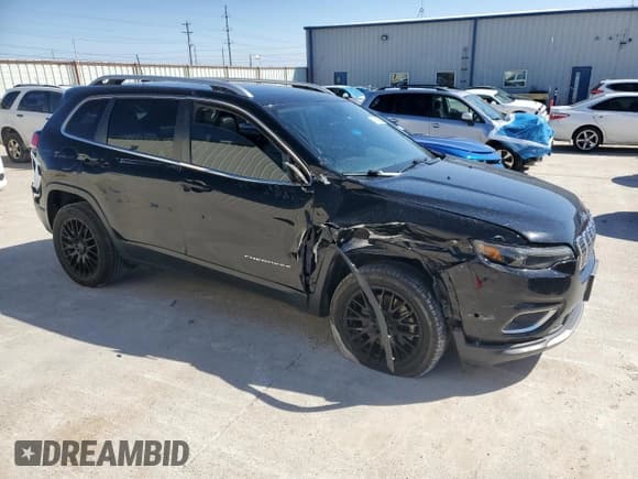 ✅ 2019 Jeep Cherokee Limited • VIN: 1C4PJLDN0KD128284 • Lot: 47640765. Listed on Copart with 136,991 mi. Free auction sales archive from the USA and detailed vehicle history report at DreamBid. Image 4.