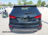 ✅ 2017 Hyundai Santa Fe 2.4L • VIN: 5XYZTDLBXHG440736 • Lot: 42234524. Listed on IAAI with 134,045 mi. Free auction sales archive from the USA and detailed vehicle history report at DreamBid. Image 16.
