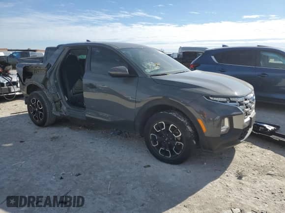 2022 Hyundai Santa Cruz SEL с VIN 5NTJB4AE6NH009524, выставлен на аукционе Copart как лот 87423074 с пробегом 47 567 миль миль и Списание • Salvage title. История ставок и продаж доступна на DreamBid. Изображение 4.