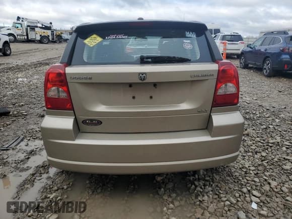 ✅ 2009 Dodge Caliber SXT • VIN: 1B3HB48AX9D259703 • Лот: 80551064. Опубликован ранее на Copart с пробегом 128 818 миль. Бесплатный доступ к архиву аукционных продаж из США и подробный отчёт об истории автомобиля на DreamBid. Изображение 6.