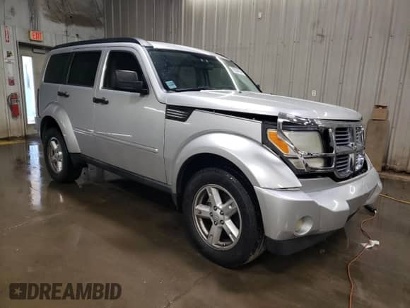 2008 Dodge Nitro SXT с VIN 1D8GU28KX8W129037, выставлен на аукционе Copart как лот 79534734 с пробегом 162 073 миль миль и Списание • Salvage title. История ставок и продаж доступна на DreamBid. Изображение 4.
