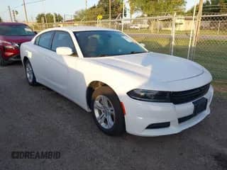 2022 Dodge Charger SXT with VIN 2C3CDXBG2NH141003, listed as a IAAI auction lot 42506279 with 60,875 mi miles and . Bid and sale history available at DreamBid. Image 1.