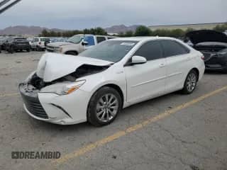 2015 Toyota Camry LE with VIN 4T1BD1FKXFU167796, listed as a Copart auction lot 70953095 with 128,819 mi miles and Salvage title. Bid and sale history available at DreamBid. Image 1.