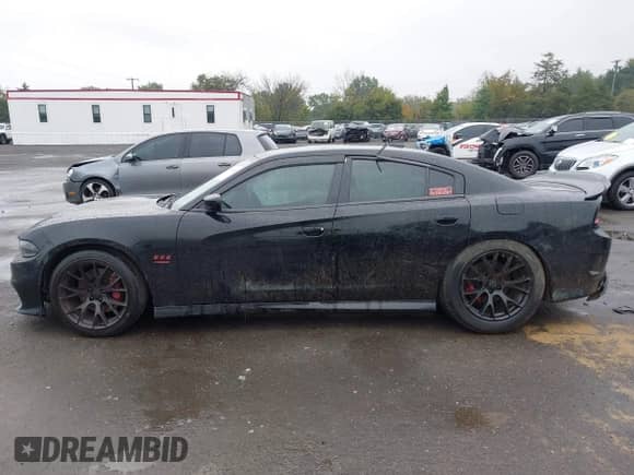 2018 Dodge Charger Daytona 392 with VIN 2C3CDXGJ5JH319050, listed as a IAAI auction lot 43308895 with 88,097 mi miles and . Bid and sale history available at DreamBid. Image 14.