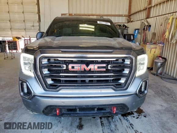 ✅ 2021 GMC Sierra 1500 AT4 • VIN: 1GTU9EET9MZ183844 • Лот: 80211985. Опубликован ранее на Copart с пробегом 86 980 миль. Бесплатный доступ к архиву аукционных продаж из США и подробный отчёт об истории автомобиля на DreamBid. Изображение 5.