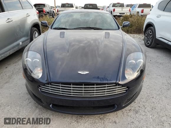 ✅ 2009 Aston Martin DB9 • VIN: SCFAD01E79GA12139 • Lot: 76241164. Wystawiony na Copart z przebiegiem Nie podano. Bezpłatny archiwum sprzedaży aukcyjnych z USA i szczegółowy raport historii pojazdu na DreamBid. Zdjęcie 5.