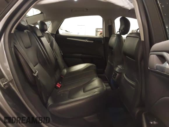 ✅ 2014 Ford Fusion Titanium Hybrid • VIN: 3FA6P0RU1ER217906 • Lot: 42563246. Listed on IAAI with 66,335 mi. Free auction sales archive from the USA and detailed vehicle history report at DreamBid. Image 8.