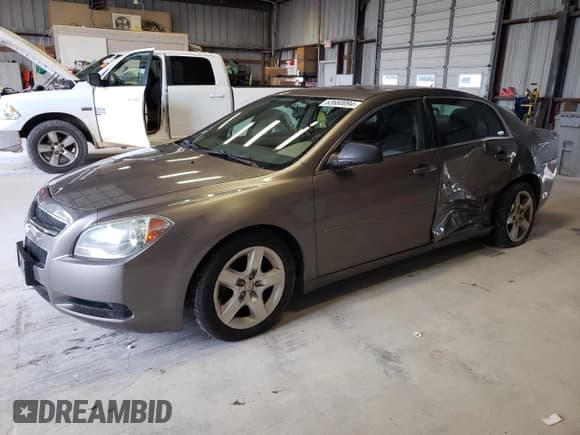 ✅ 2011 Chevrolet Malibu 1LS • VIN: 1G1ZB5E17BF265605 • Lot: 63680094. Listed on Copart with 149,872 mi. Free auction sales archive from the USA and detailed vehicle history report at DreamBid. Image 1.