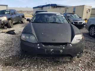 2006 Hyundai Tiburon GT с VIN KMHHN65F86U221847, выставлен на аукционе Copart как лот 42923865 с пробегом 188 494 миль миль и Списание • Salvage title. История ставок и продаж доступна на DreamBid. Изображение 5.