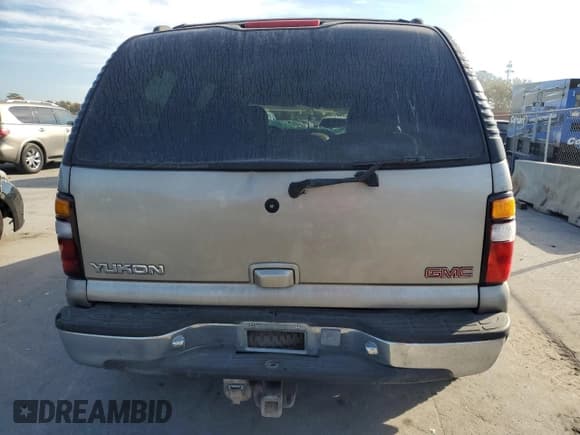 ✅ 2000 GMC Yukon SLE • VIN: 1GKEK13T2YJ130870 • Lot: 82887054. Wystawiony na Copart z przebiegiem 310 765 mil. Bezpłatny archiwum sprzedaży aukcyjnych z USA i szczegółowy raport historii pojazdu na DreamBid. Zdjęcie 6.