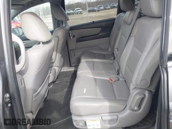 ✅ 2016 Honda Odyssey Touring Elite • VIN: 5FNRL5H99GB072860 • Lot: 42157603. Listed on IAAI with 221,449 mi. Free auction sales archive from the USA and detailed vehicle history report at DreamBid. Image 8.