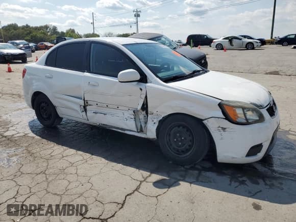 ✅ 2010 Kia Rio LX • VIN: KNADH4A35A6680550 • Лот: 80386105. Опубликован ранее на Copart с пробегом 259 120 миль. Бесплатный доступ к архиву аукционных продаж из США и подробный отчёт об истории автомобиля на DreamBid. Изображение 4.