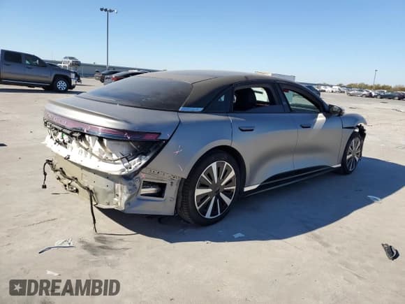 ✅ 2022 Lucid Air Grand Touring • VIN: 50EA1GBA9NA004285 • Lot: 82369014. Wystawiony na Copart z przebiegiem 27 451 mil. Bezpłatny archiwum sprzedaży aukcyjnych z USA i szczegółowy raport historii pojazdu na DreamBid. Zdjęcie 3.