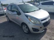✅ 2014 Chevrolet Spark LS • VIN: KL8CA6S94EC411022 • Lot: 43478062. Listed on IAAI with 151,002 mi. Free auction sales archive from the USA and detailed vehicle history report at DreamBid. Image 1.