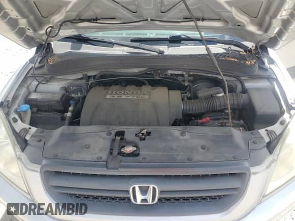 2005 Honda Pilot LX with VIN 2HKYF181X5H567993, listed as a Copart auction lot 70019185 with 107,227 mi miles and Salvage title. Bid and sale history available at DreamBid. Image 12.