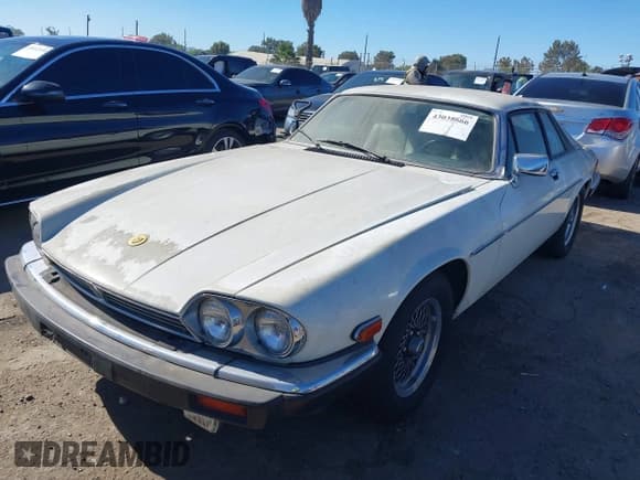 ✅ 1990 Jaguar XJ • VIN: SAJTW5849LC174931 • Лот: 43038666. Опубликован ранее на IAAI с пробегом 93 252 миль. Бесплатный доступ к архиву аукционных продаж из США и подробный отчёт об истории автомобиля на DreamBid. Изображение 2.