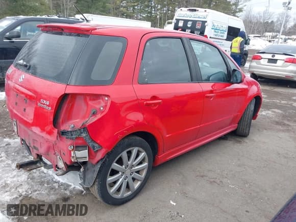 ✅ 2011 Suzuki SX4 Sportback • VIN: JS2YA5A51B6300935 • Lot: 41526960. Listed on IAAI with 152,624 mi. Free auction sales archive from the USA and detailed vehicle history report at DreamBid. Image 4.